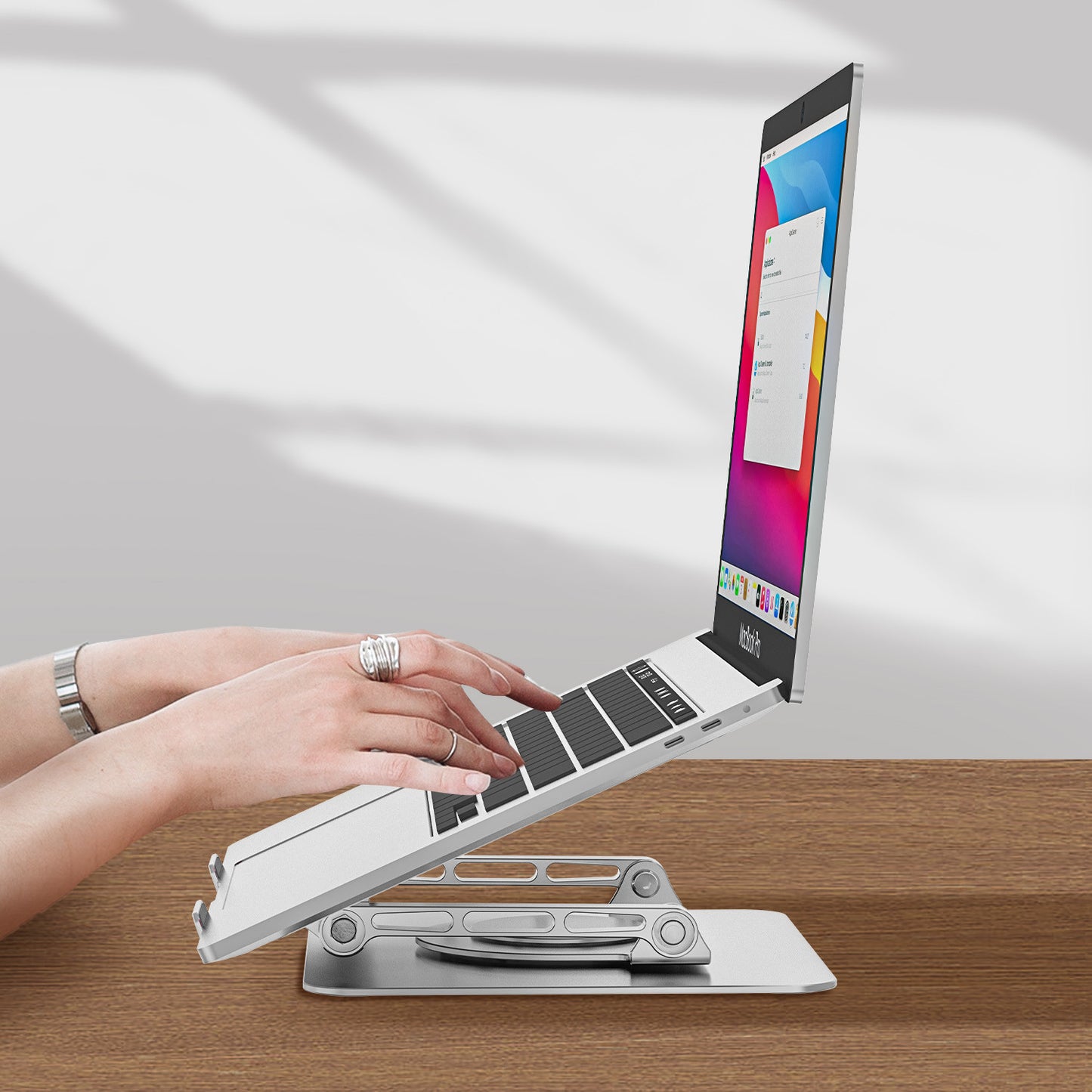Foldable Adjustable Rotating Aluminum Laptop Stand by DigestWell Co.