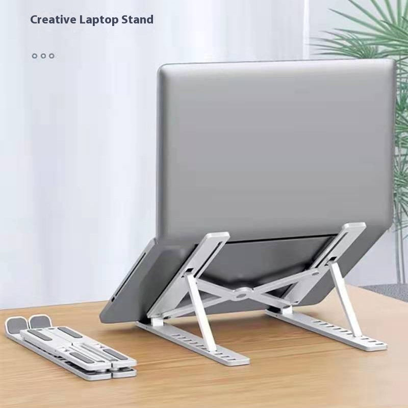 Laptop on a stand with a white background