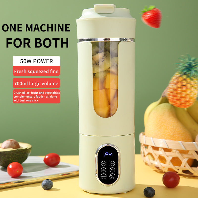Portable blender with fruits and vegetables on a green background